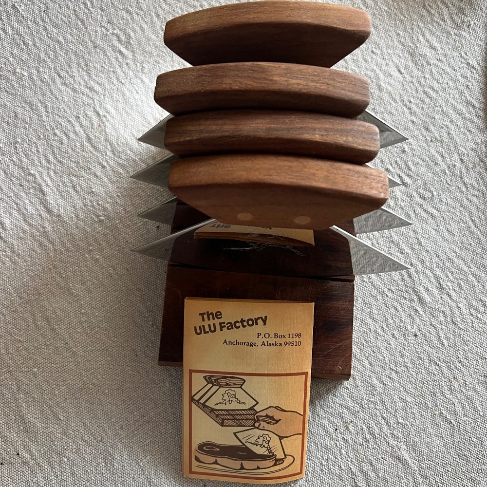 Set of four Alaska ulus ulu in wooden stand with booklet Looks  new!